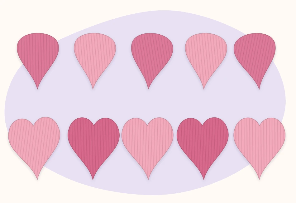 Teardrop and heart-shaped crepe paper petals laid out in two rows