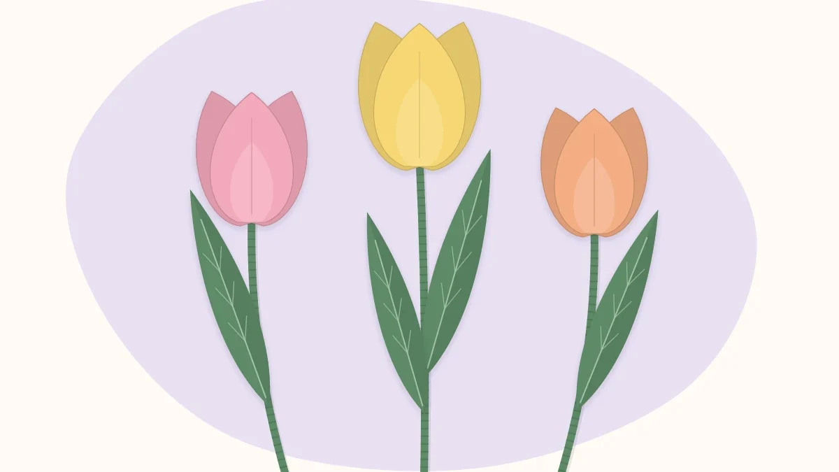 Three crepe paper tulips in different colors with long green leaves
