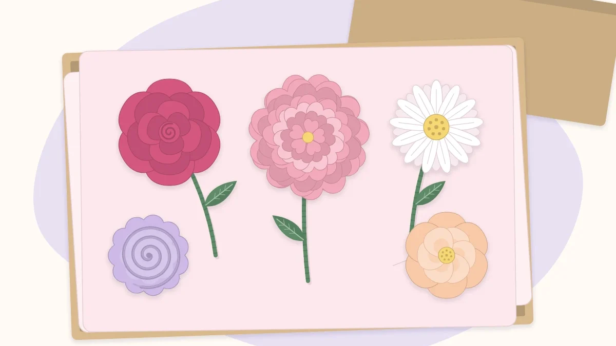 Paper flowers resting face up in an open box lined with white tissue paper
