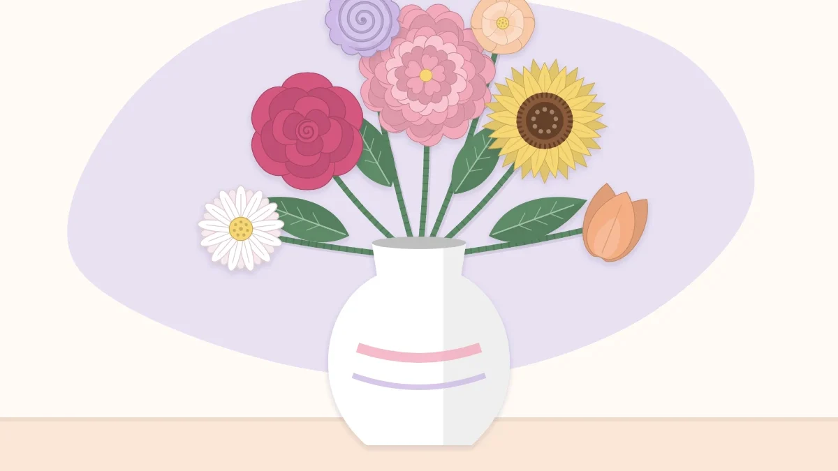 A paper flower arrangement in a simple vase with flowers at varied heights