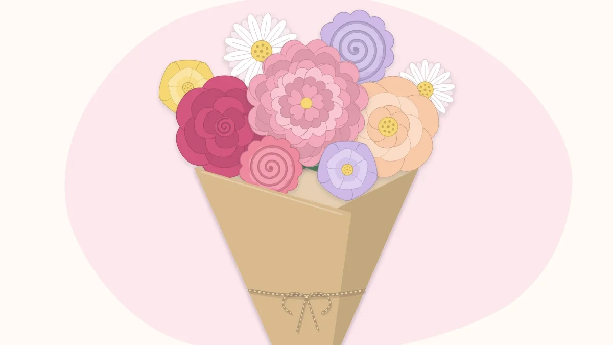 A round hand-tied paper flower bouquet wrapped in kraft paper