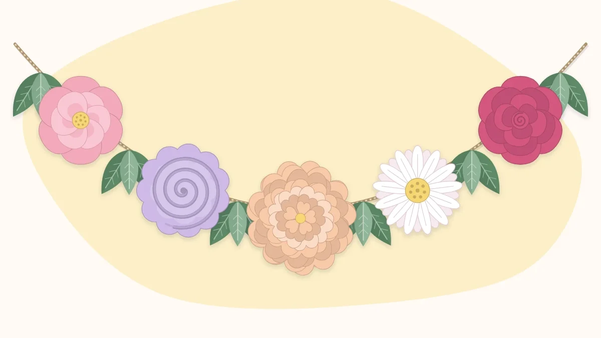 A paper flower garland draped in a gentle curve with green leaves between the flowers