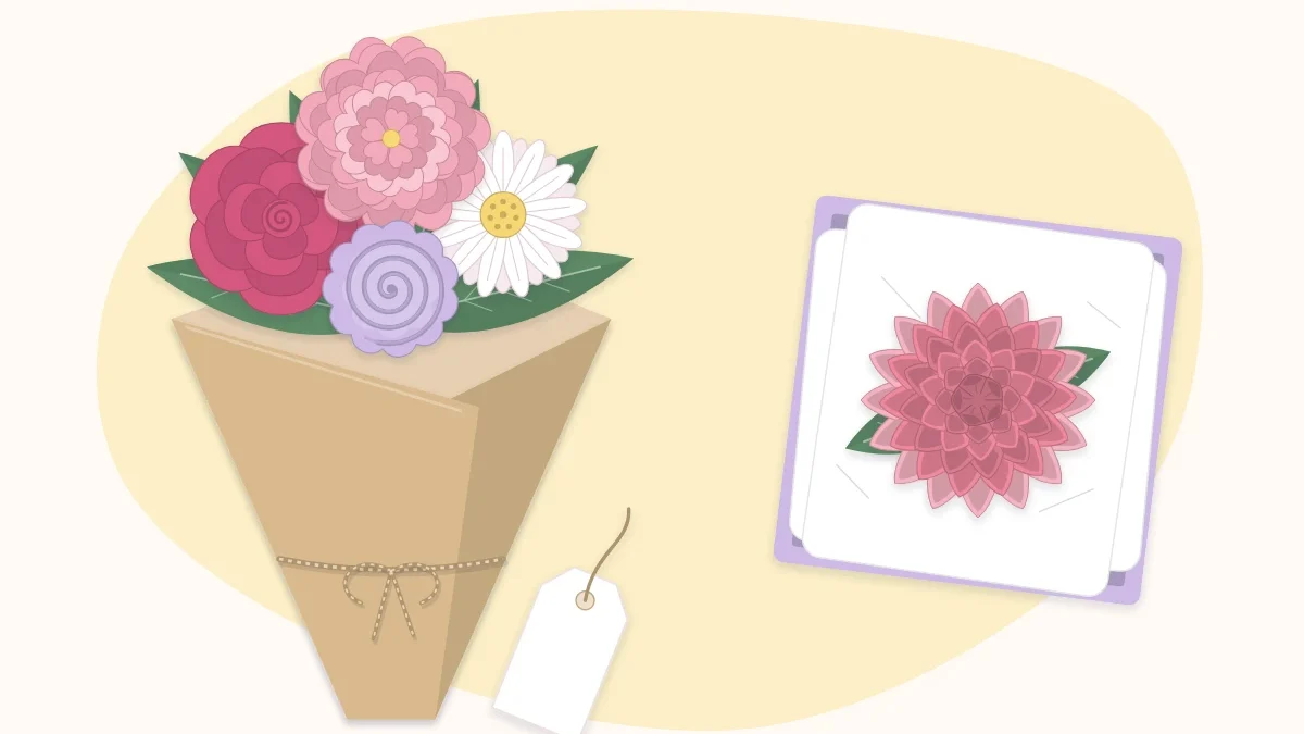 A small paper flower bouquet with a blank gift tag beside a single paper flower in a box
