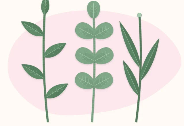 Three wrapped green wire stems, each with paper leaves in a different shape