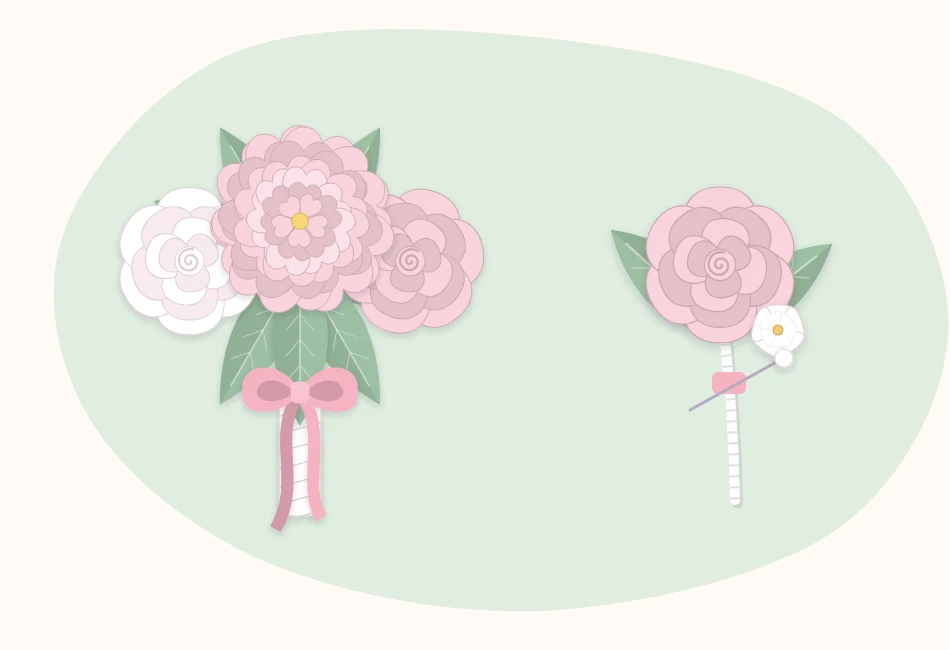 A small white and blush paper flower bouquet lying beside a single-flower boutonniere with one leaf