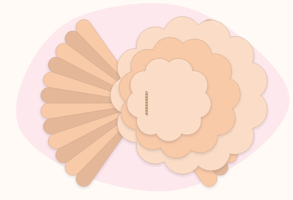 Tied tissue paper strip fanned open with the top layers pulled up toward the center on one side